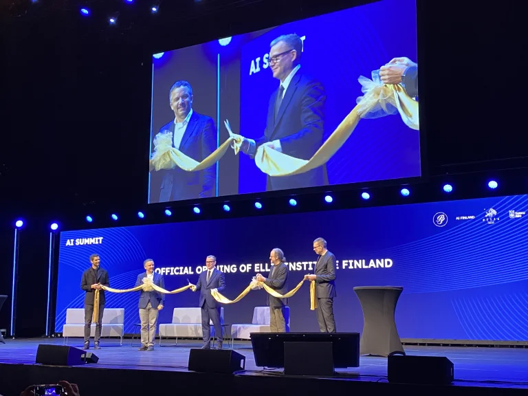 Ceremonial ribbon-cutting by Peter Sarlin (Institute Co-Founder & CEO at AMD Silo AI), Serge Belongie (ELLIS President), Petteri Orpo (Prime Minister of Finland), Bernhard Schölkopf (ELLIS Co-Founder), and Samuel Kaski (Institute Founding Director and ELLIS Fellow).