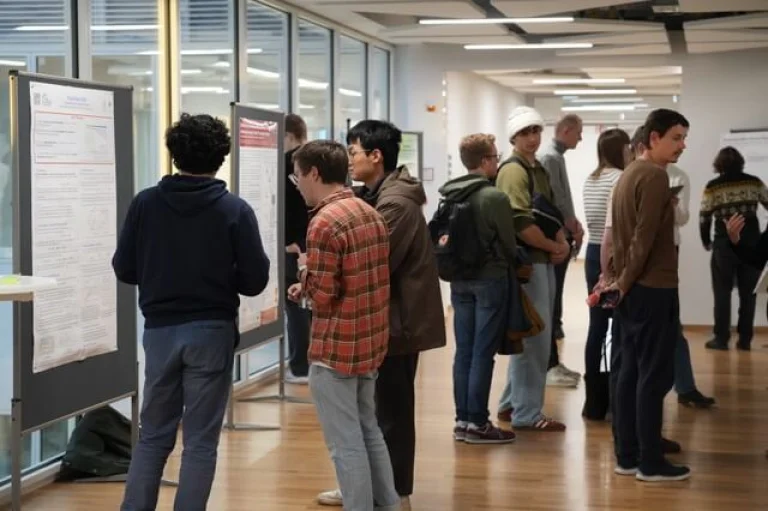 ELLIS Pre-NeurIPS Fest 2025: Institute Tuebingen, people looking at posters