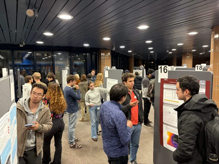 ELLIS Pre-NeurIPS Fest 2025: Unit Lausanne, people looking at posters