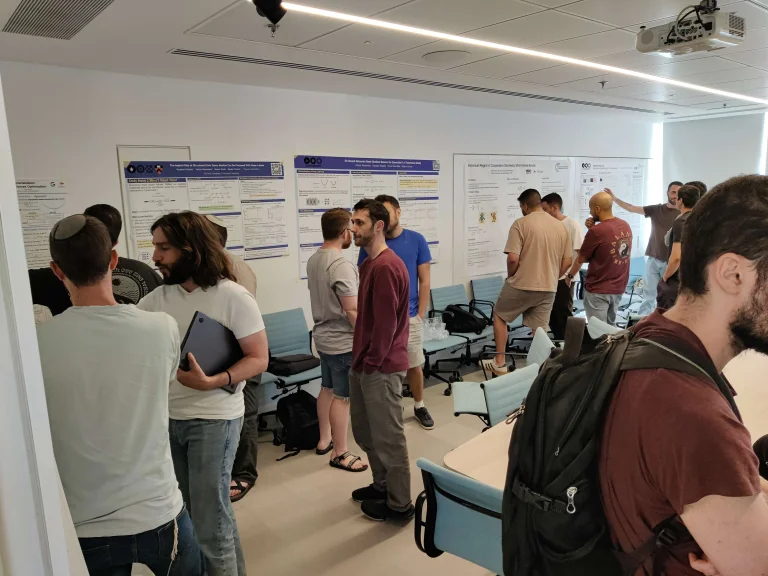 ELLIS Pre-NeurIPS Fest 2025: Unit Tel Aviv, people looking at posters