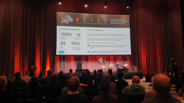 Vincent Fortuin presenting the ELLIS network during the Welcoming Remarks.
